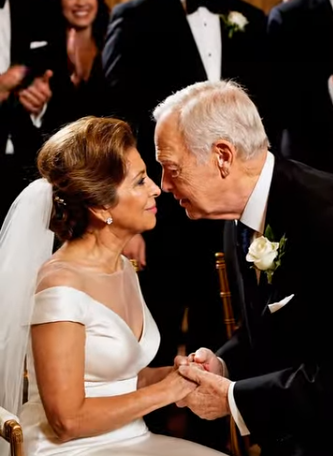 “Act Like You’re With Me” — Forced to the Back Row at Her Own Son’s Wedding After the Bride Whispered, “Your Poverty Will Embass Us,” a Grieving Mother Tried to Disappear Until a Silver-Haired Stranger Took Her Hand, Made the Entire Garden Go Quiet, and Turned the Seating Chart Meant to Humiliate Her Into the First Crack in a Secret Nobody at That Wedding Was Ready to Face